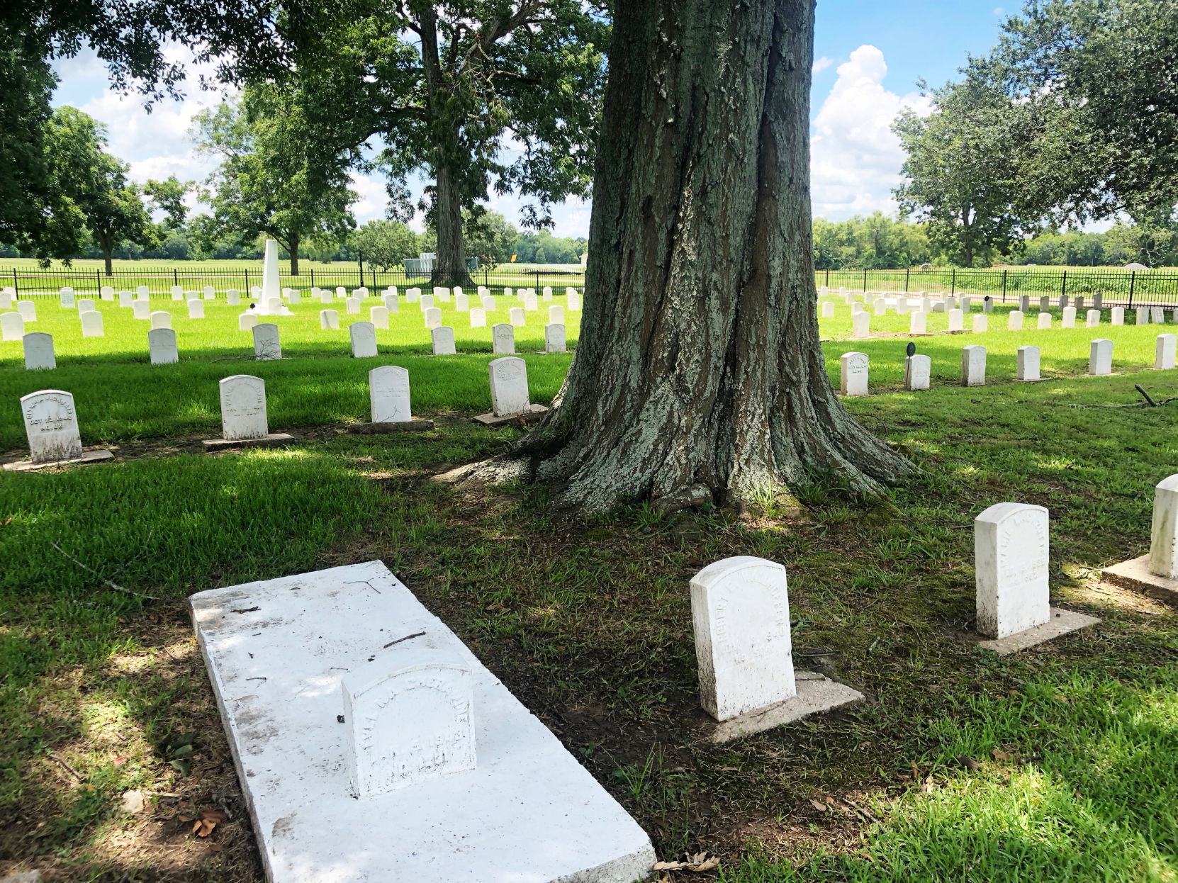 Markes for former leprosy patients line a graveyard in the former leprosy colony at what is now the Gillis W. Long National Guard Center in Carville